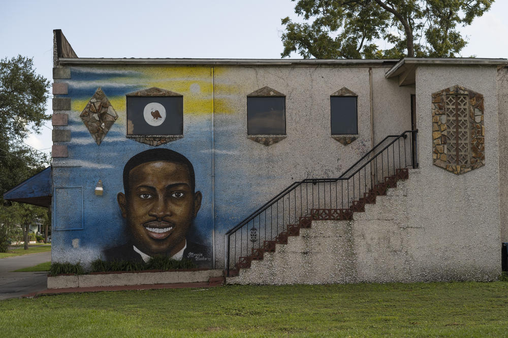 Memories - some visible and some hidden - are scattered around Brunswick, including this mural of Ahmaud Arbery.