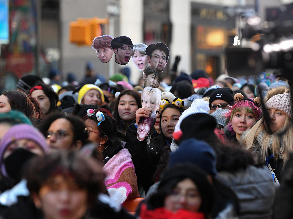 Fans await the K-pop boy band BTS visit to the <em>Today</em> show at Rockefeller Plaza in New York City last year.