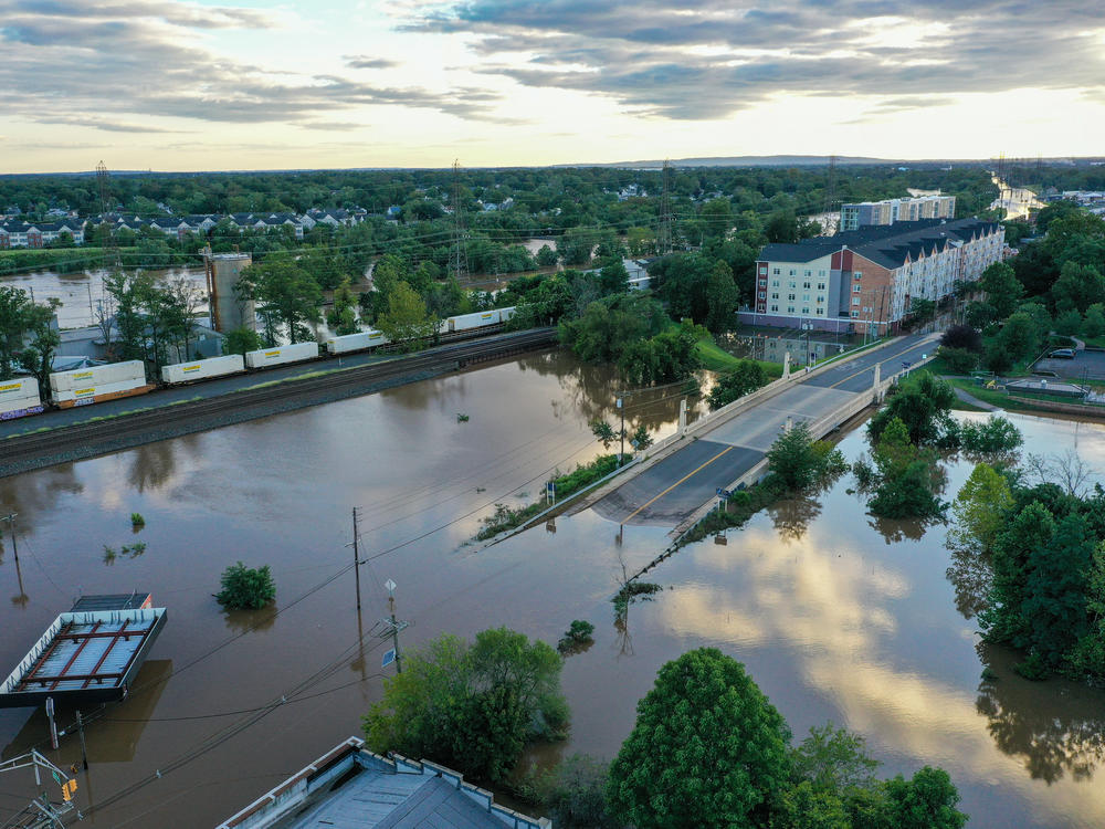 An aerial view of a community in Middlesex as floodwater covers streets after Hurricane Ida left behind flash floods east coast. A new report from First Street Foundation estimates that more than 2 million miles of road are at risk from floods.