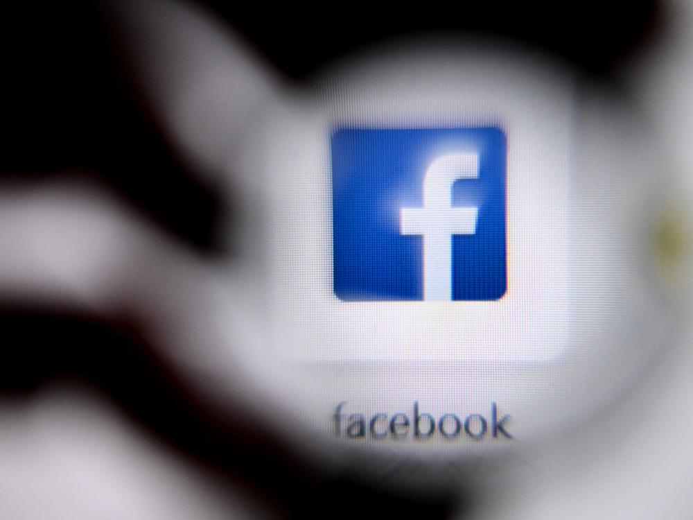 The U.S. online social media and social networking service Facebook's logo is shown on a laptop screen. Facebook has announced changes to its policies on online bullying.