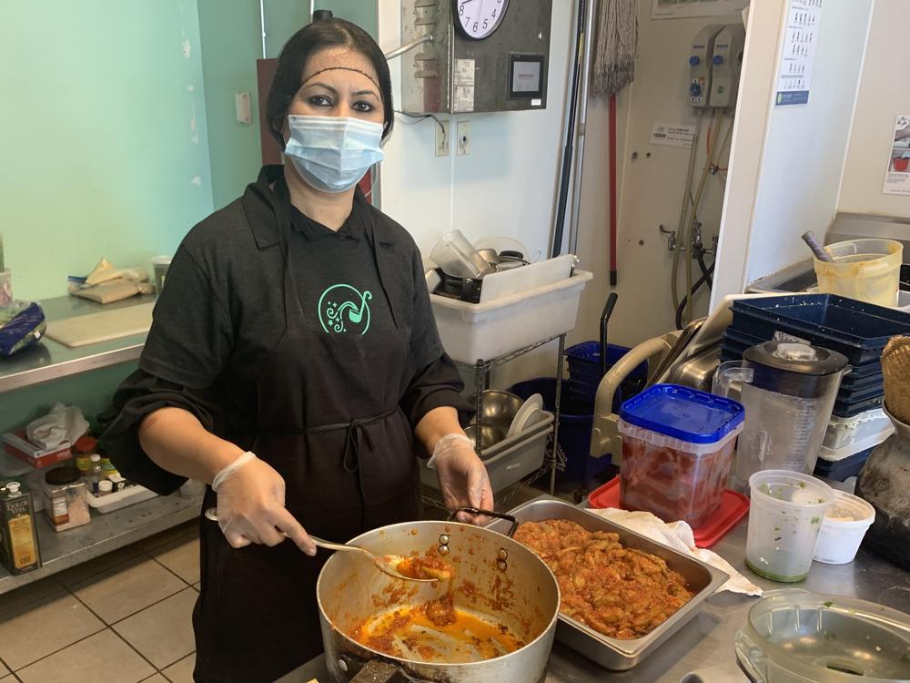 Zainab in the kitchen at Foodhini, a delivery-only restaurant in Washington, D.C., that features the cooking of immigrants and refugees.