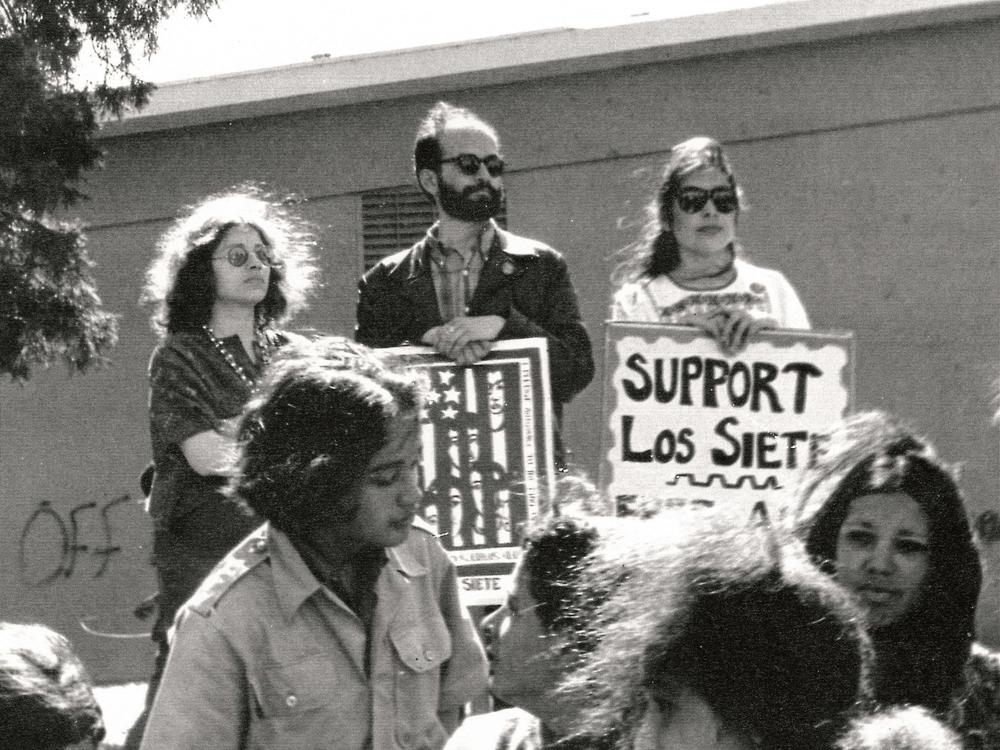 Yolanda López (far right) is pictured at a rally at Holly Park in San Francisco.