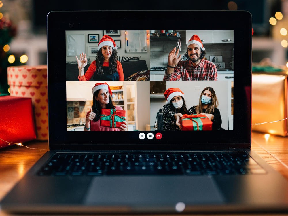 A video call on a laptop screen during Christmas. The Centers for Disease Control and Prevention released new guidance on Friday for safely celebrating the upcoming holiday season.