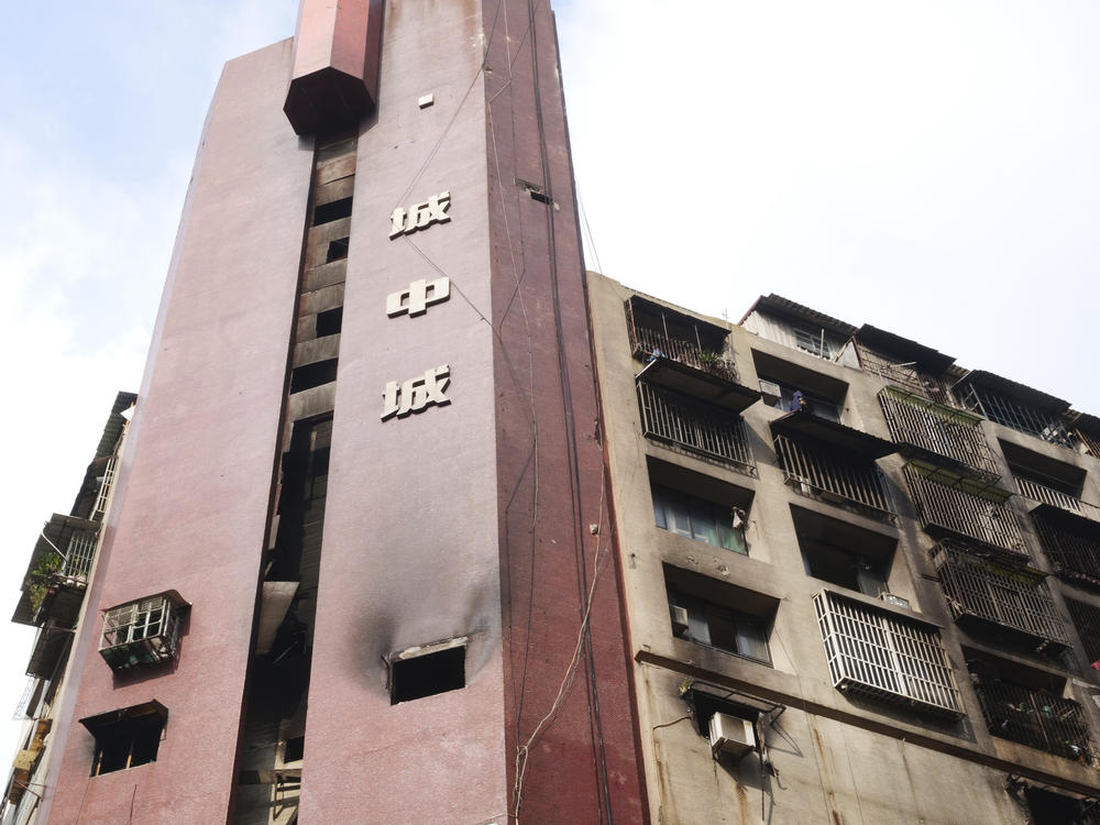 A burnt building is pictured in Kaohsiung in southern Taiwan on Friday. Dozens were killed and dozens more injured after a fire broke out early Thursday in a decades-old mixed commercial and residential building in the Taiwanese port city of Kaohsiung, officials said.