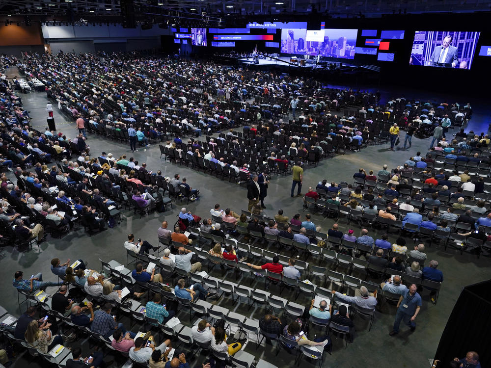 In this June 16, 2021, file photo, people attend the morning session of the Southern Baptist Convention annual meeting in Nashville, Tenn.