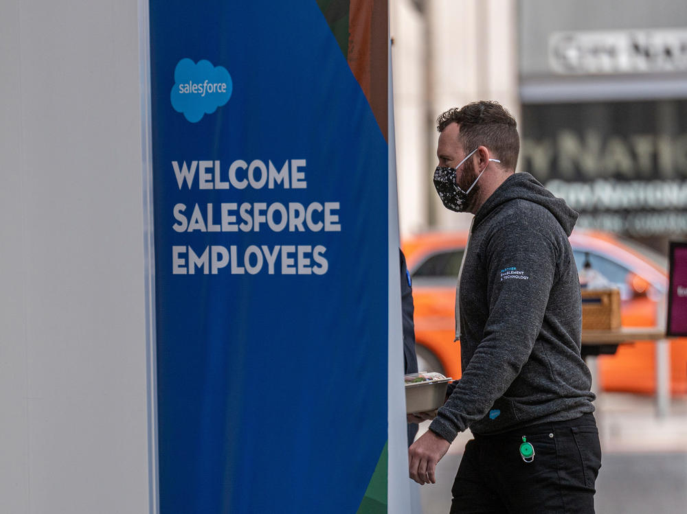 An employee enters the Salesforce office in San Francisco, on Oct. 5. Benioff often acts when he feels policies adversely impact his employees.