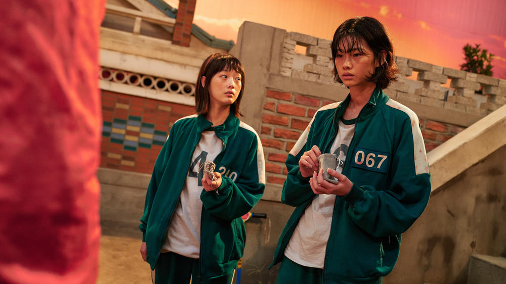 Sae-byeok and her marble game partner Ji-yeong.
