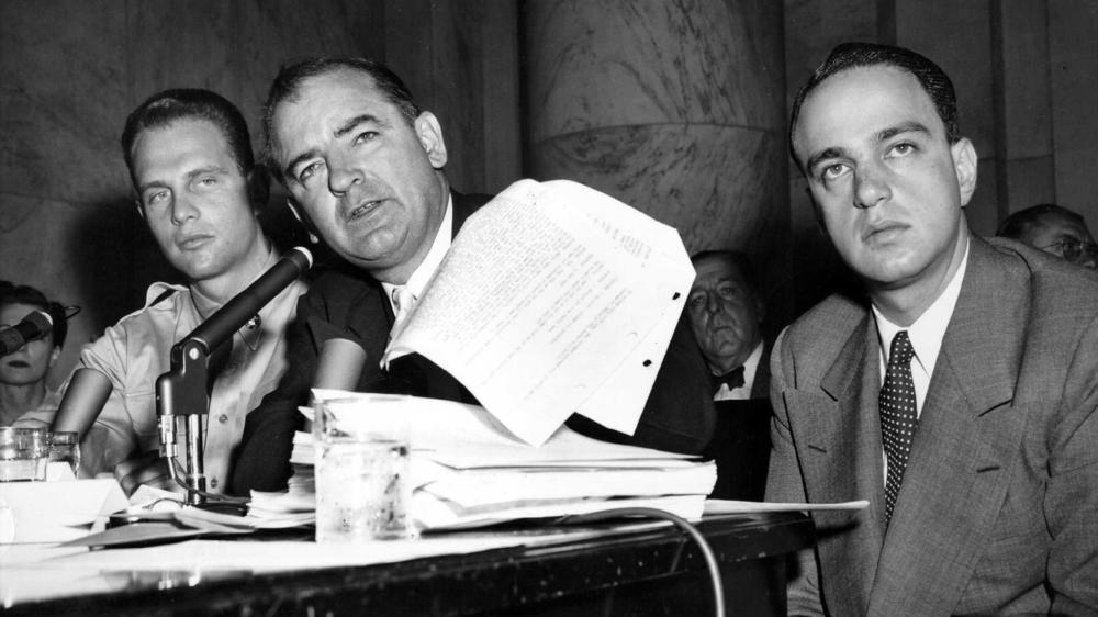 Sen. Joe McCarthy is seen during the Army-McCarthy hearings on June 7, 1954, in Washington, D.C. On the right is McCarthy's chief counsel, Roy Cohn.