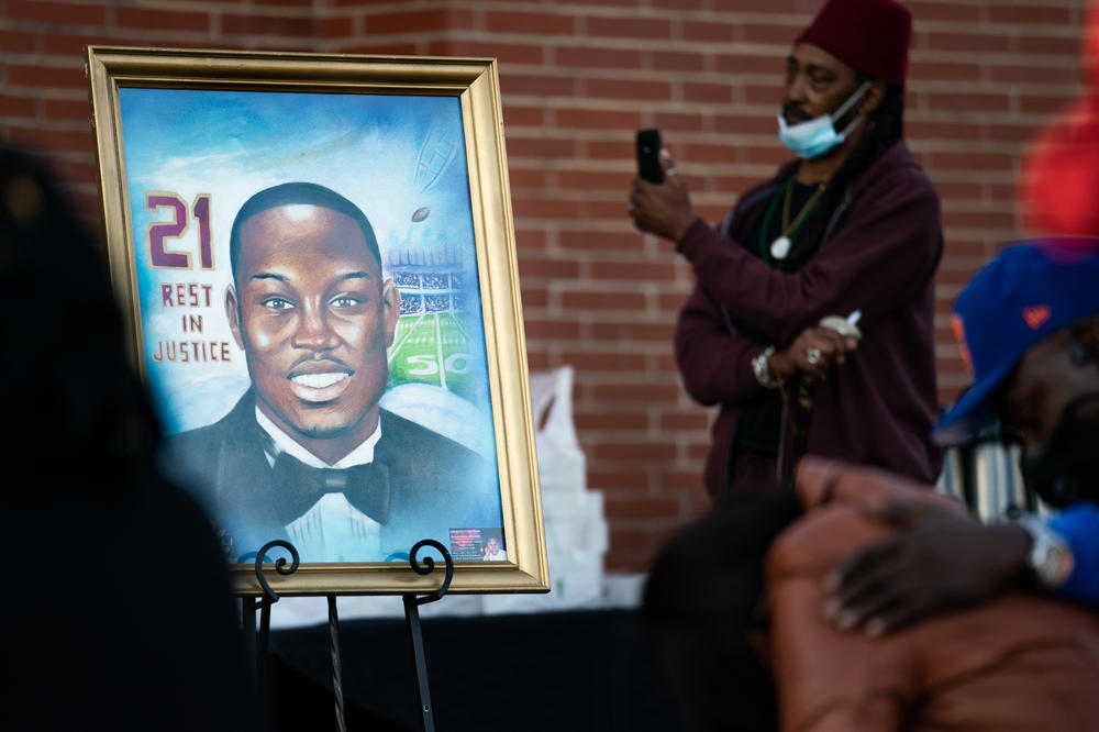 A painting of Ahmaud Arbery is displayed during a vigil at New Springfield Baptist Church on Feb. 23 in Waynesboro, Ga.