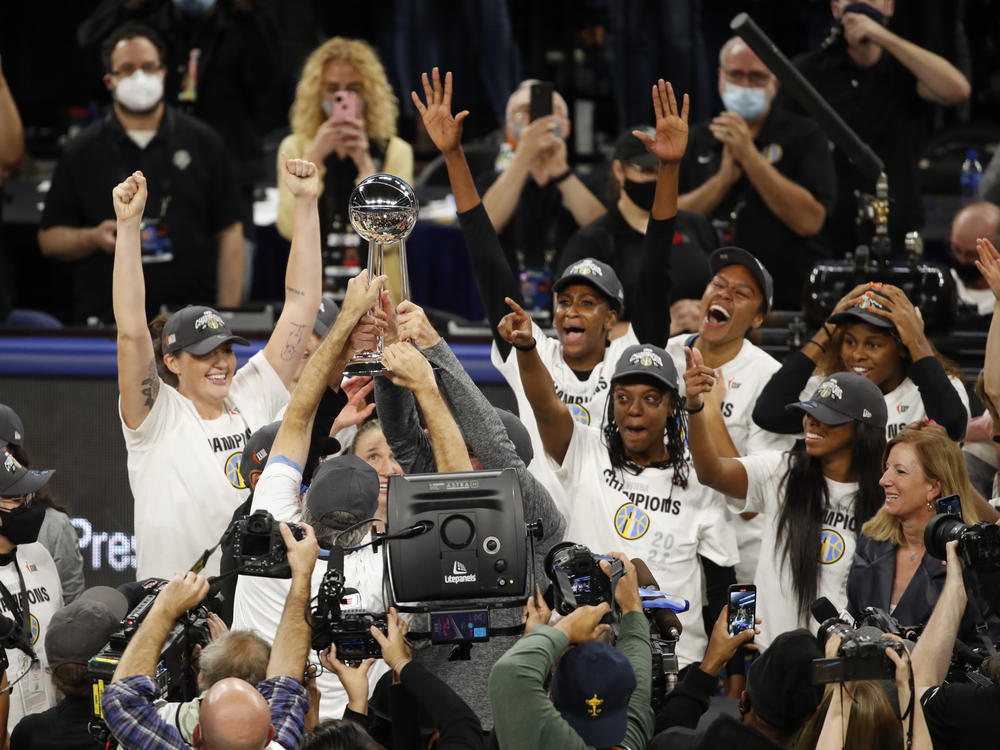 The Chicago Sky celebrate after winning Game Four of the 2021 WNBA Finals against the Phoenix Mercury on Sunday at the Wintrust Arena in Chicago, Illinois. It's the city's first-ever WNBA title.