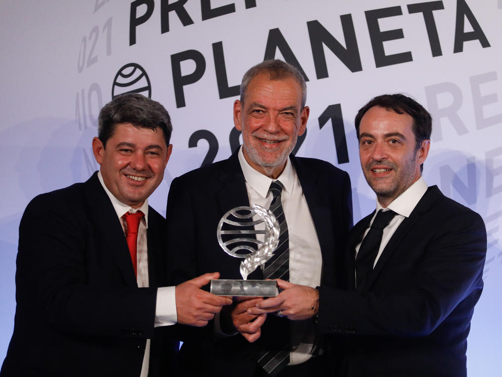 The writer Carmen Mola, pseudonym of the writers Jorge Diaz, Agustin Martinez and Antonio Mercero, winner of the 70th edition of the Planeta Novel Prize, gives a press conference after the award ceremony, at the Museu Nacional d'Art de Catalunya, on 15 October 2021, in Barcelona, Catalonia.