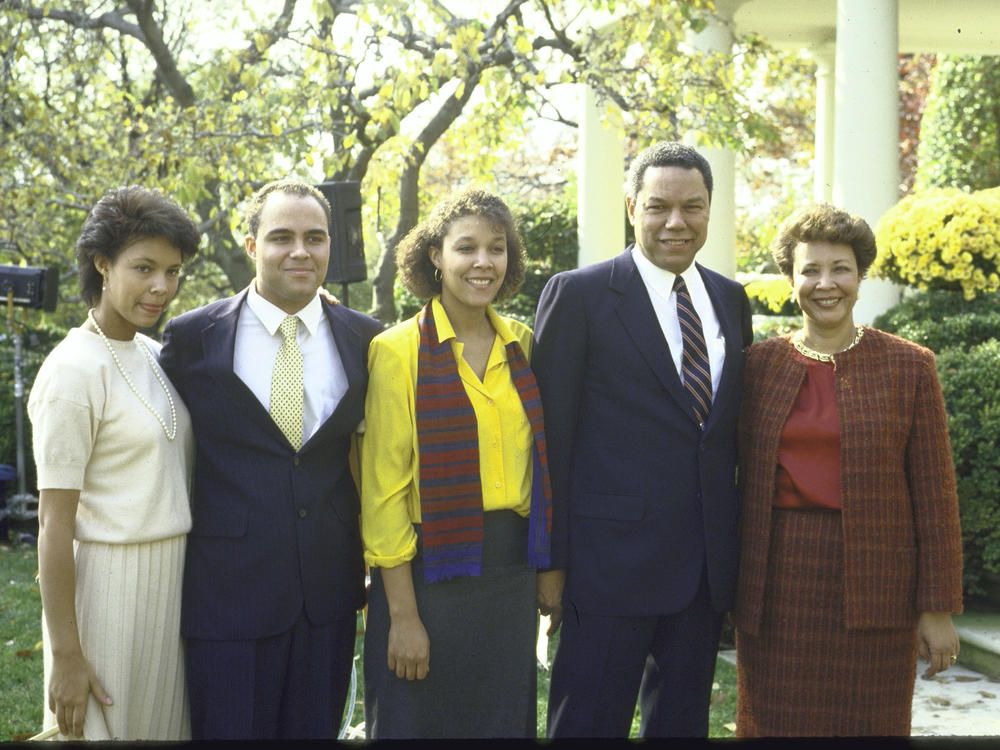 Newly named national security adviser Lt. Gen. Colin Powell poses with his family after his appointment to that position in November 1987.