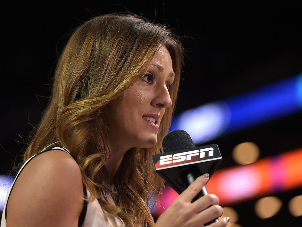 ESPN reporter Allison Williams reports from a college basketball tournament at Barclays Center in Brooklyn, N.Y., on March 8, 2017. Williams said in a recent Instagram video that she is leaving ESPN due to the company's vaccine mandate.