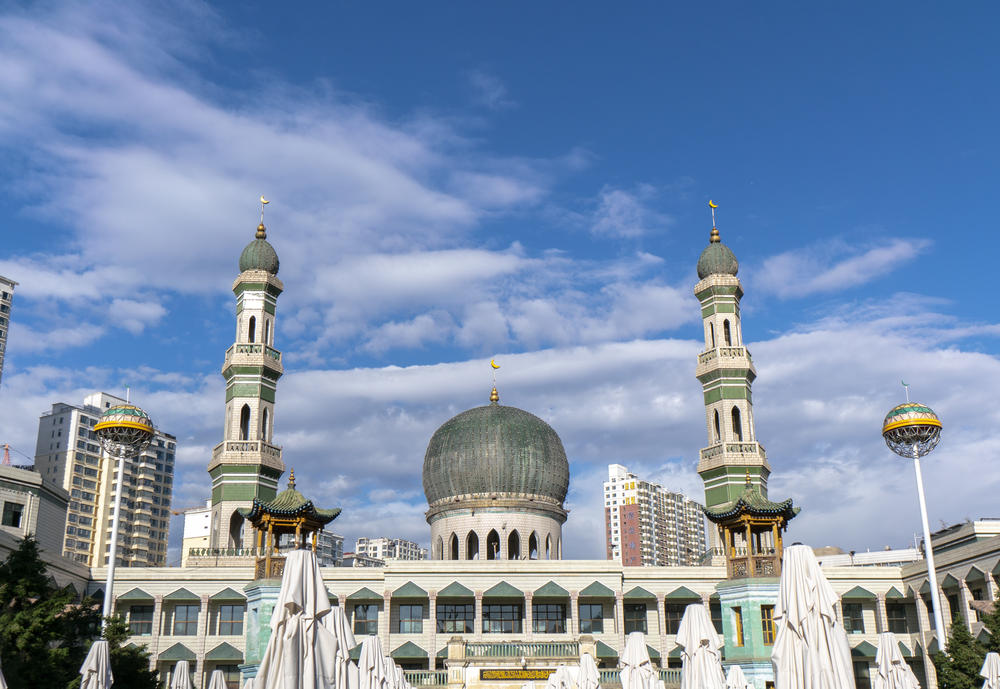 The Dongguan Great Mosque in Xining, China, photographed in 2018. Its main green dome and minaret domes have since been removed.