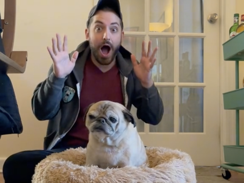 Jonathan Graziano with his pug, Noodle. The two have taken to forecasting the mood of the day based on whether Noodle stands up or flops down in bed.