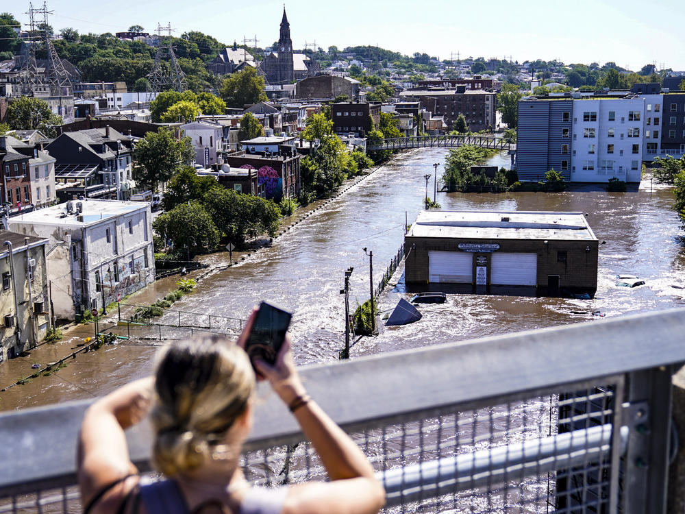 The Schuylkill River floods Philadelphia in the aftermath of Hurricane Ida in September. The extreme rain caught many by surprise, trapping people in basements and cars and killing dozens.