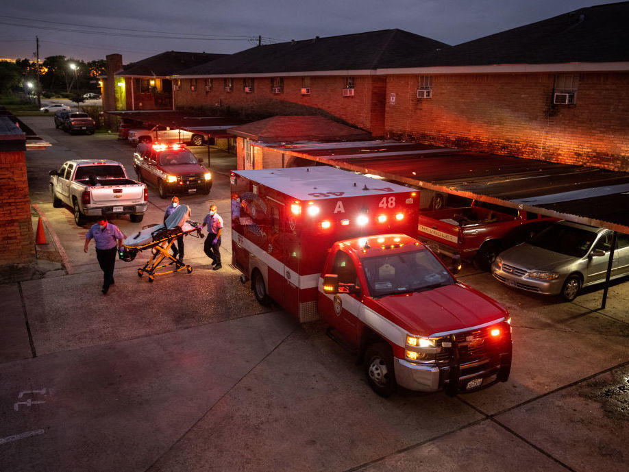 Houston Fire Department paramedics prepare to transport a COVID-19 positive woman to a hospital on September 15, 2021 in Houston, Texas. While the virus is still rampant in the U.S., some vaccinated people will continue to get infected.