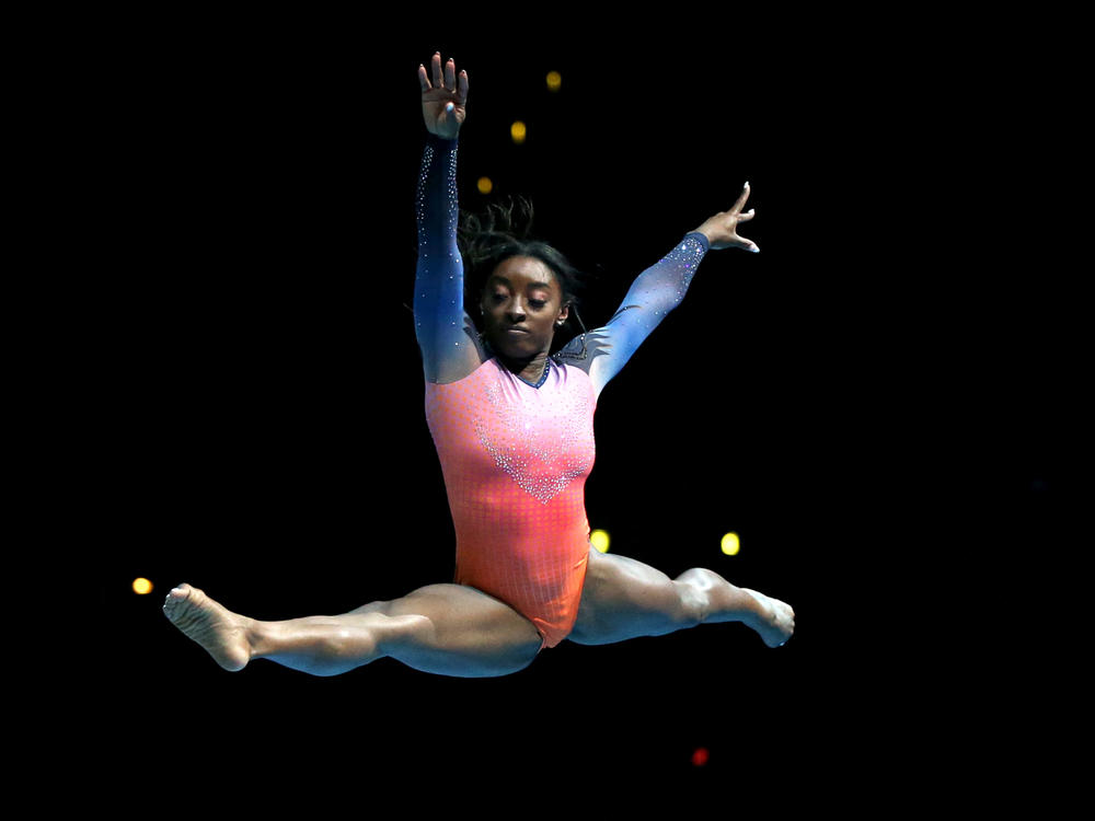 Simone Biles performs during the Gold Over America Tour. In an interview, she says she is still not performing twists.