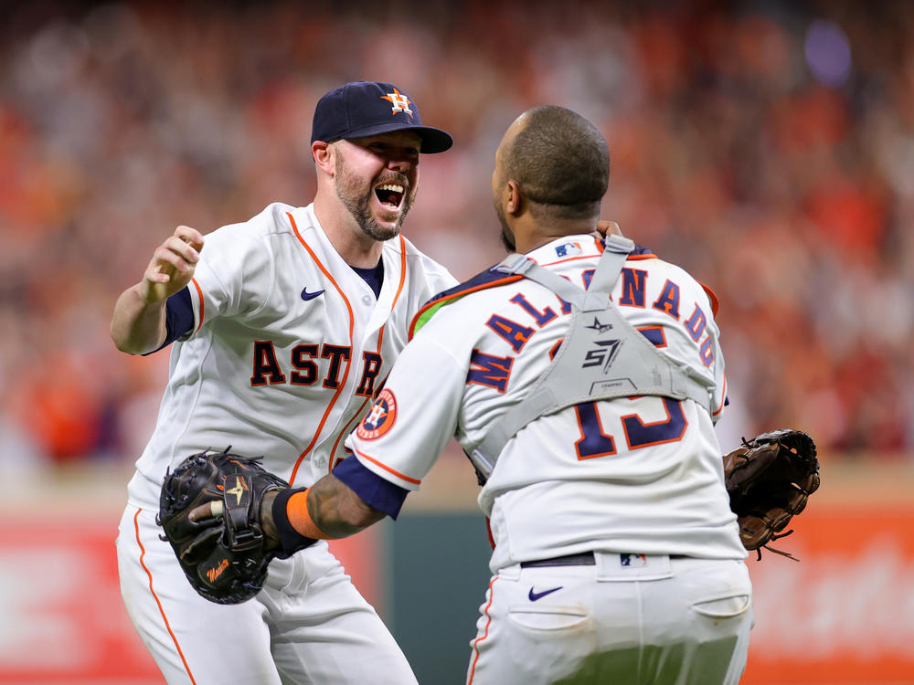 Ryan Pressly of the Houston Astros celebrates with Martin Maldonado after the final out in the ninth inning, defeating the Boston Red Sox 5-0 on Friday  and advancing to the World Series.