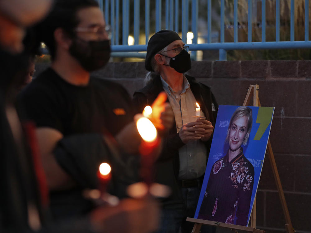 New Mexico residents attend a candlelight vigil to honor cinematographer Halyna Hutchins in Albuquerque, N.M. Saturday, Oct. 23, 2021. Hutchins was fatally shot on Thursday on the set of a Western filmed in Santa Fe, N.M.