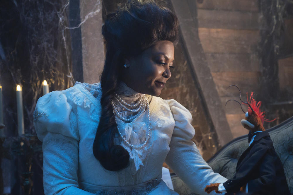 Taraji P. Henson and Pepe the King Prawn in <em>Muppets Haunted Mansion.</em>