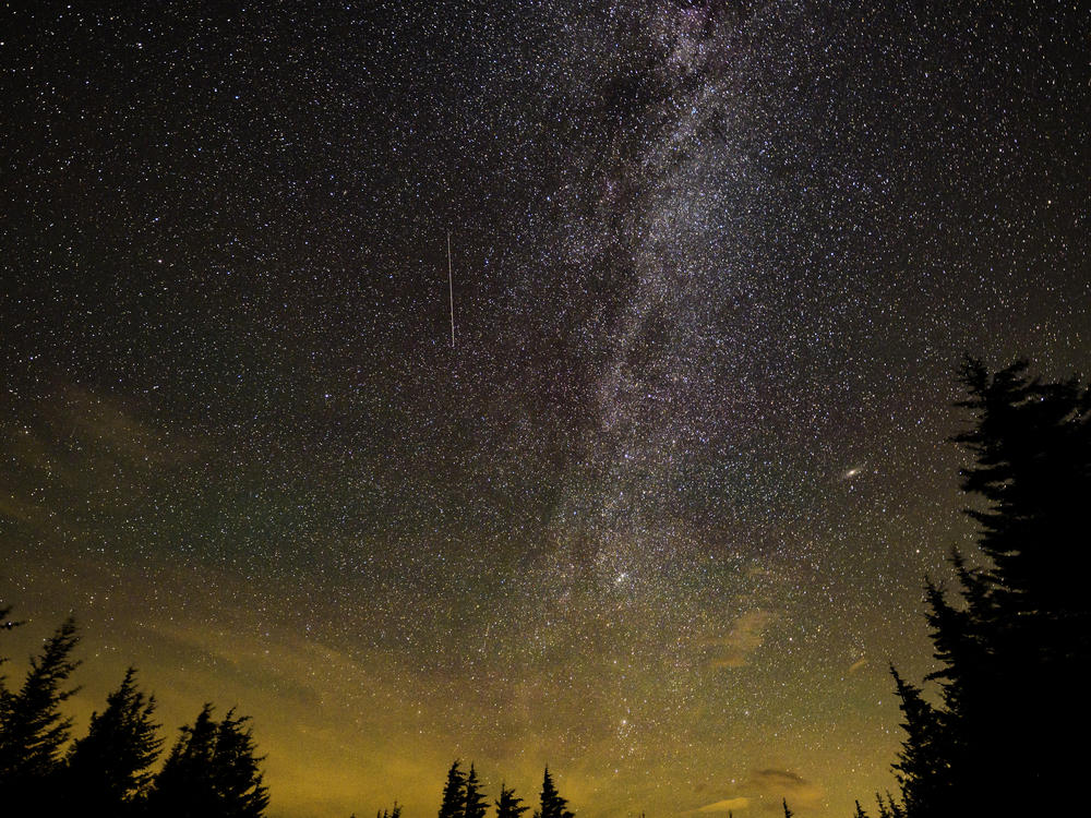In this 30 second exposure, a meteor streaks across the sky during the annual Perseid meteor shower on Aug. 10, 2021, in Spruce Knob, West Virginia.