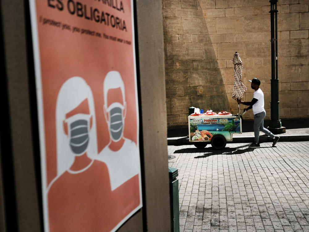 A vendor walks through Old San Juan, Puerto Rico, in March.