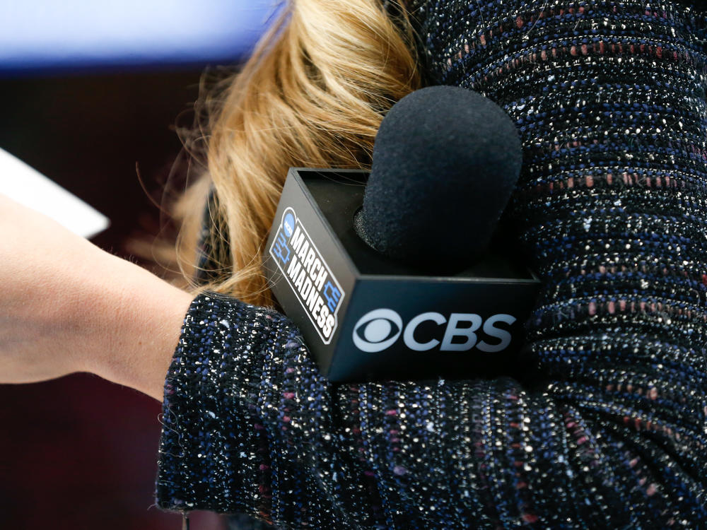 A detail view of the CBS and March Madness logos displayed on a microphone during the NCAA Division I men's championship second round basketball game on March 18, 2018 at Little Caesars Arena in Detroit.