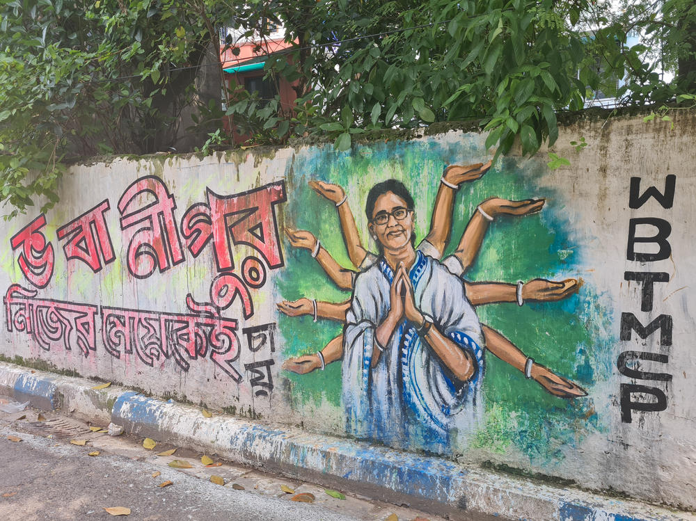 Graffiti in Kolkata depicts West Bengal's Chief Minister Mamata Banerjee as the 10-armed Hindu goddess Durga, ahead of a Hindu festival called Durga Puja celebrating the goddess.