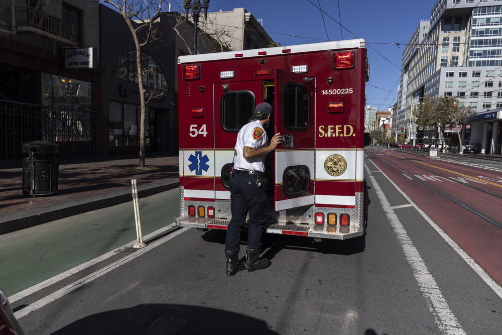 Fire Department Capt. Michael Mason with the city's Street Overdose Response Team arrives at the scene of a reported drug overdose in downtown San Francisco.