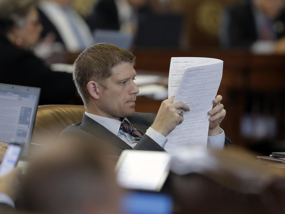 Texas state Rep. Matt Krause looks over the calendar as lawmakers rush to finish business in Austin, Texas, in May 2017.