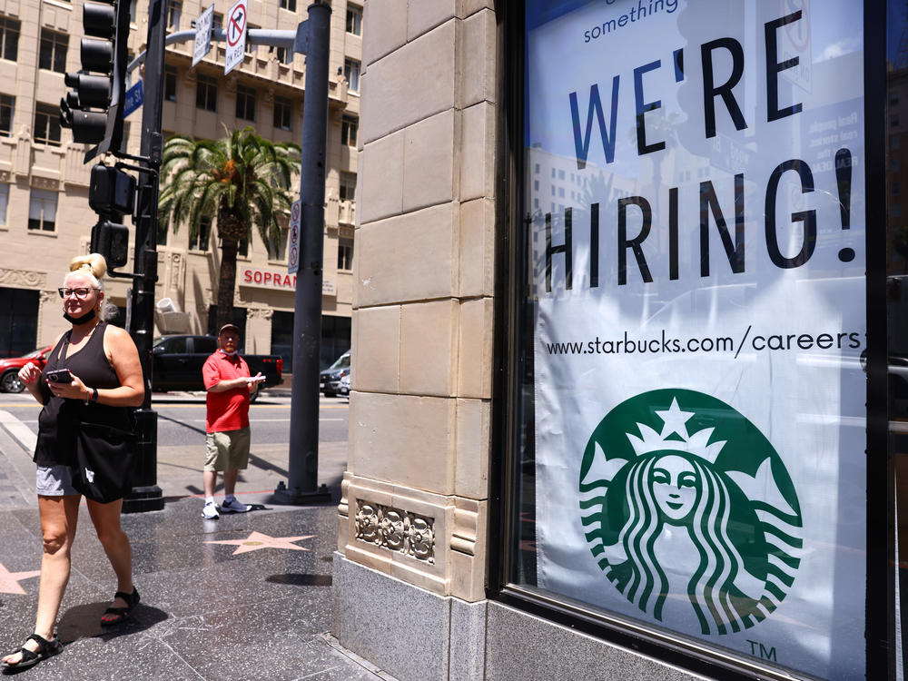 Facing a union effort, Starbucks, which is also making changes to training and scheduling, says that it supports the workers' right to organize but that a union was unnecessary.