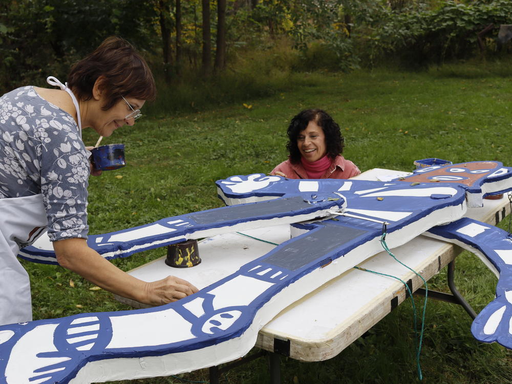 At Rokeby in Red Hook, N.Y., parade volunteers work on oversize puppets inspired by children's drawings