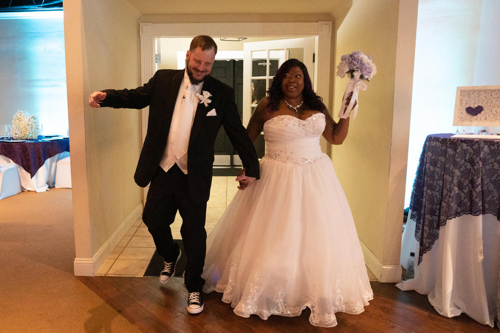 Nunny and Scott Reece celebrate after renewing their vows on Feb. 8, 2020, fulfilling Nunny's dream of having a big wedding. 