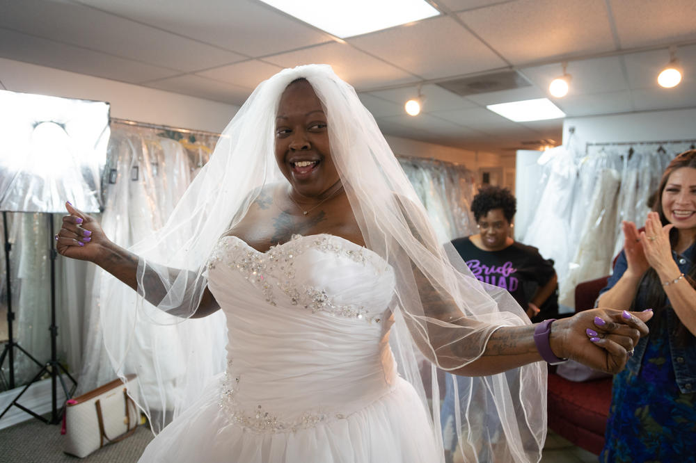 Nunny Reece picks out her wedding dress with her bridesmaids. Reece felt relieved to find her perfect dress because of concerns of swelling as a result of her steroid treatment. 