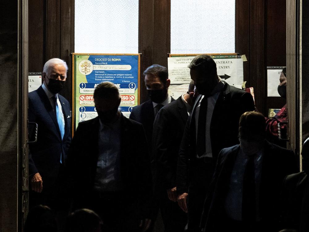 President Biden leaves Saint Patrick's Church after attending mass on Saturday in Rome on the sidelines of the G-20 summit.