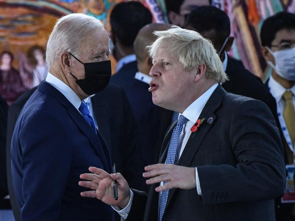 President Biden and British Prime Minister Boris Johnson talk prior to the opening session of the G-20 summit.
