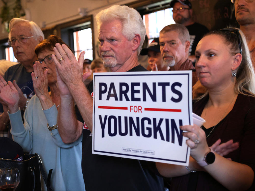In Virginia's race for governor, Republican candidate Glenn Youngkin has rallied voters around national cultural divisions playing out in schools in his campaign against former Democratic Gov. Terry McAuliffe.