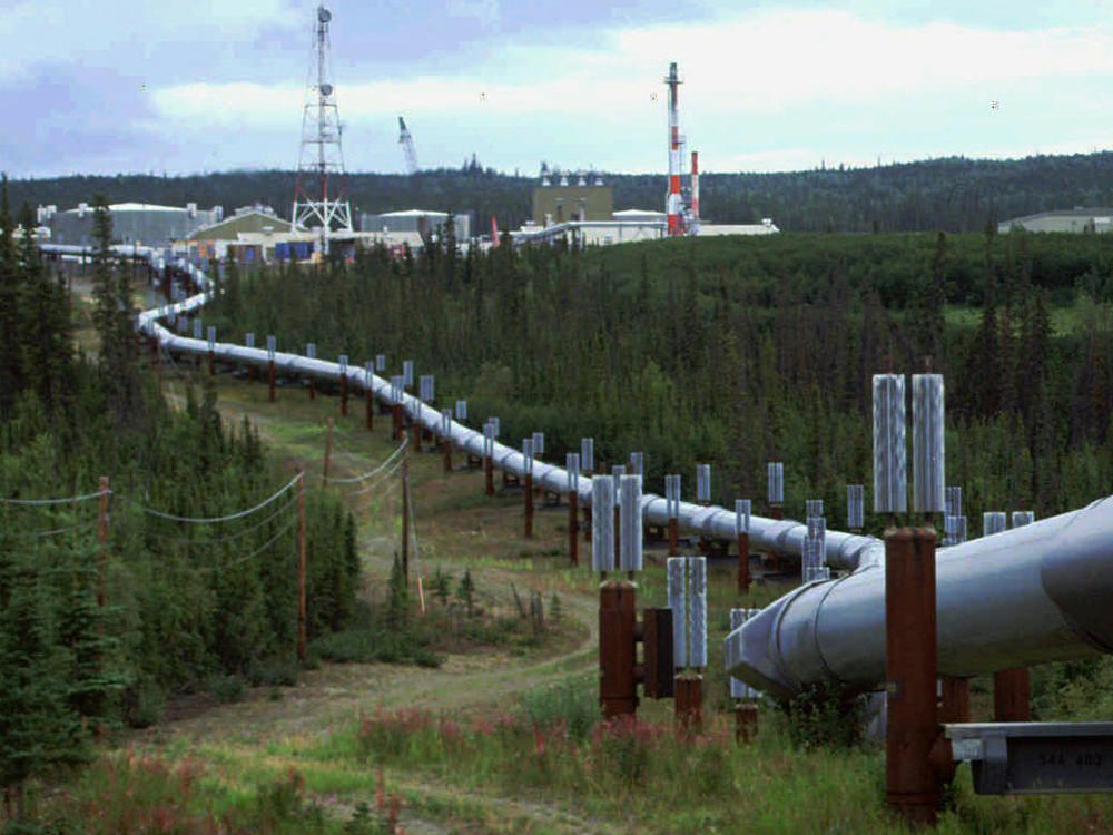 The Biden administration is announcing new and proposed regulations to limit climate-warming methane emissions from oil and gas operations and pipelines. This undated file photo shows the Trans-Alaska pipeline and pump station north of Fairbanks.