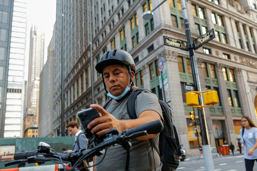 Gustavo Ajche said now during late night shifts, delivery workers cross bridges in large packs to ward off would-be thieves.