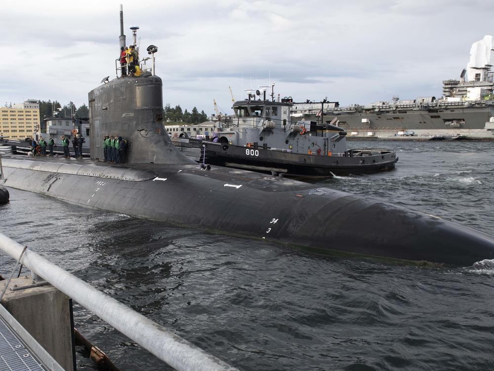 The Seawolf-class fast-attack submarine USS Connecticut smacked an undersea mountain, the Navy says. The vessel is seen here leaving Naval Base Kitsap-Bremerton for a trip across the Pacific Ocean in May.