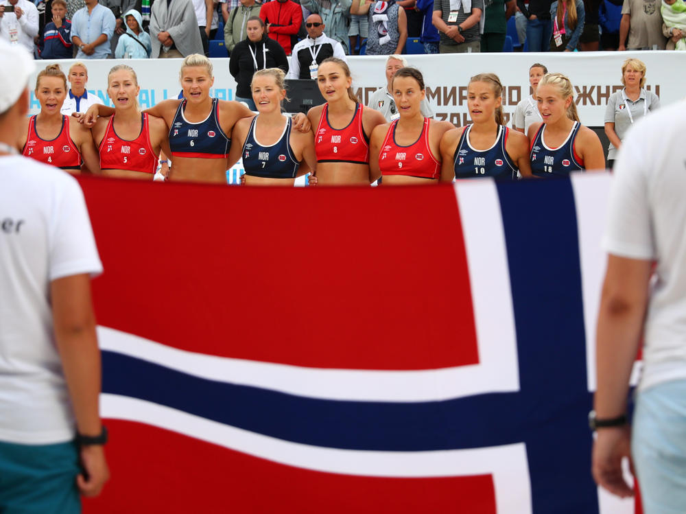 Norway's team lines up during the 2018 Women's Beach Handball World Cup final against Greece in 2018 in Kazan, Russia.