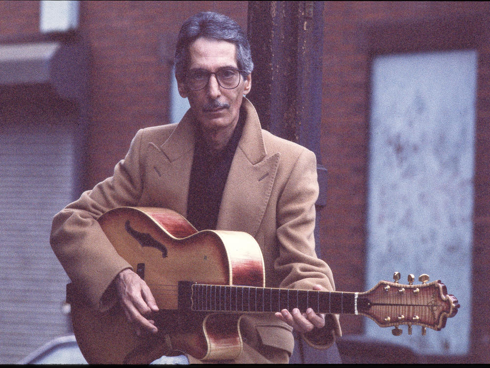 Pat Martino posing with his guitar in 1994. The celebrated jazz guitarist died Nov. 1 at age 77.