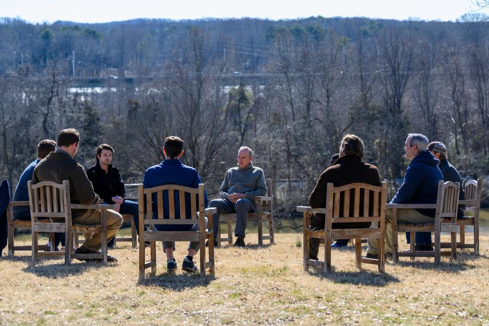 Dr. Samuel Finnix (Michael Keaton), center, during group therapy.