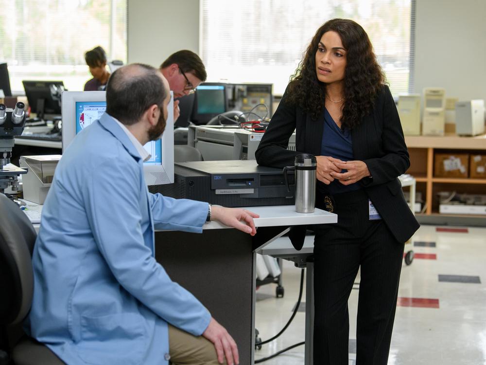 Hulu's limited series<strong> </strong>is based in part on material from the nonfiction book <em>Dopesick</em> by journalist Beth Macy, who has written extensively about the opioid crisis. Rosario Dawson stars as Bridget Meyer.