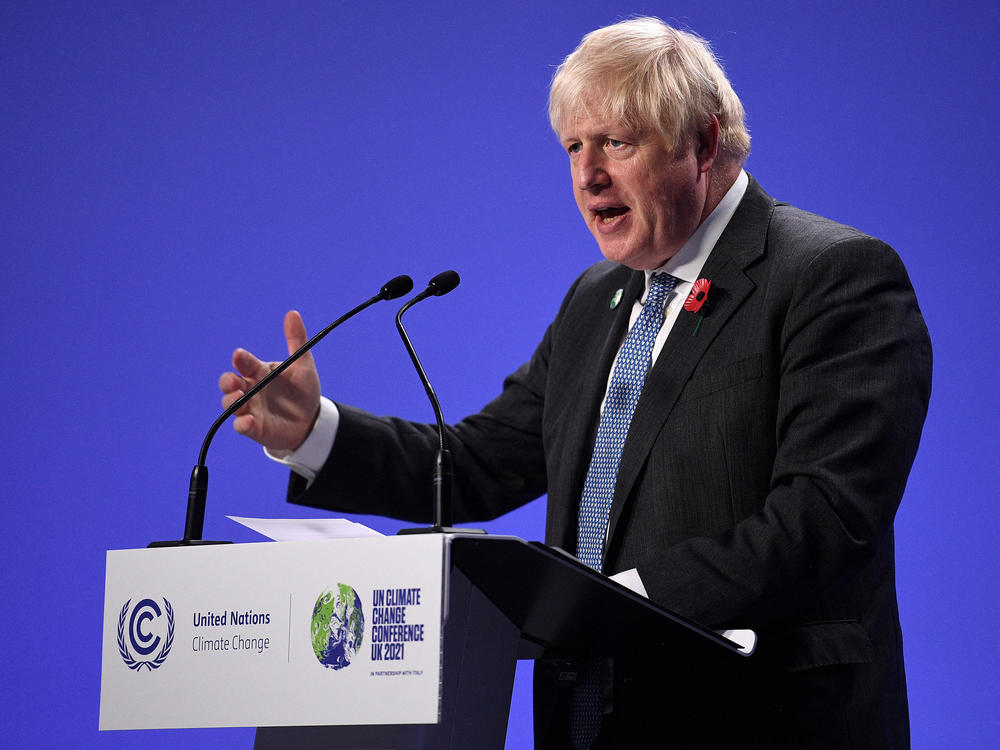 British Prime Minister Boris Johnson speaks during a news conference at the U.N. Climate Change Conference COP26 in Glasgow, Scotland, on Tuesday.