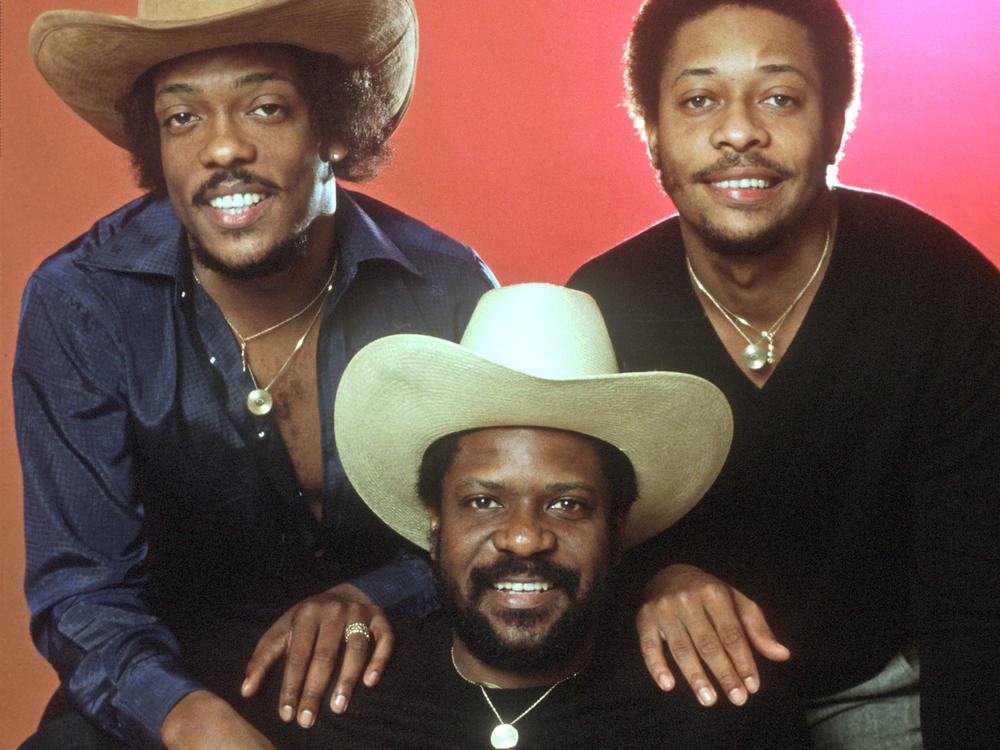 The Gap Band's Ronnie Wilson (center) with brothers Charlie and Robert Wilson, circa 1980.