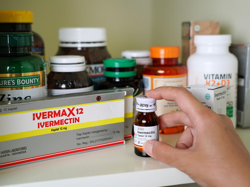 A box and container of ivermectin arranged in Jakarta, Indonesia, on Thursday, Sept. 2, 2021. The U.S. Food and Drug Administration warned Americans against taking ivermectin, an anti-parasitic drug, as treatment or prevention against Covid-19.