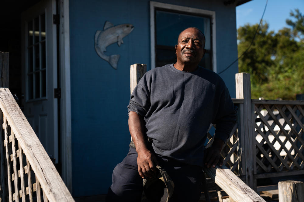 Ed Atkins poses for a portrait outside his bait shop on Lady Island, S.C.