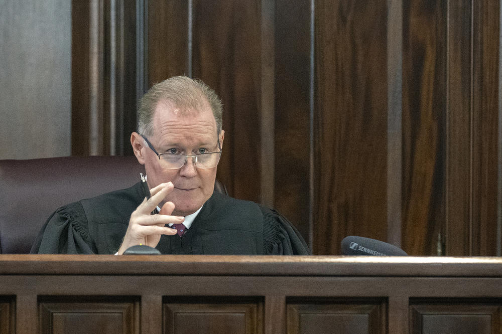 Superior Court Judge Timothy Walmsley responds to arguments during a motion hearing in the trial of Greg McMichael and his son, Travis McMichael, and a neighbor, William 